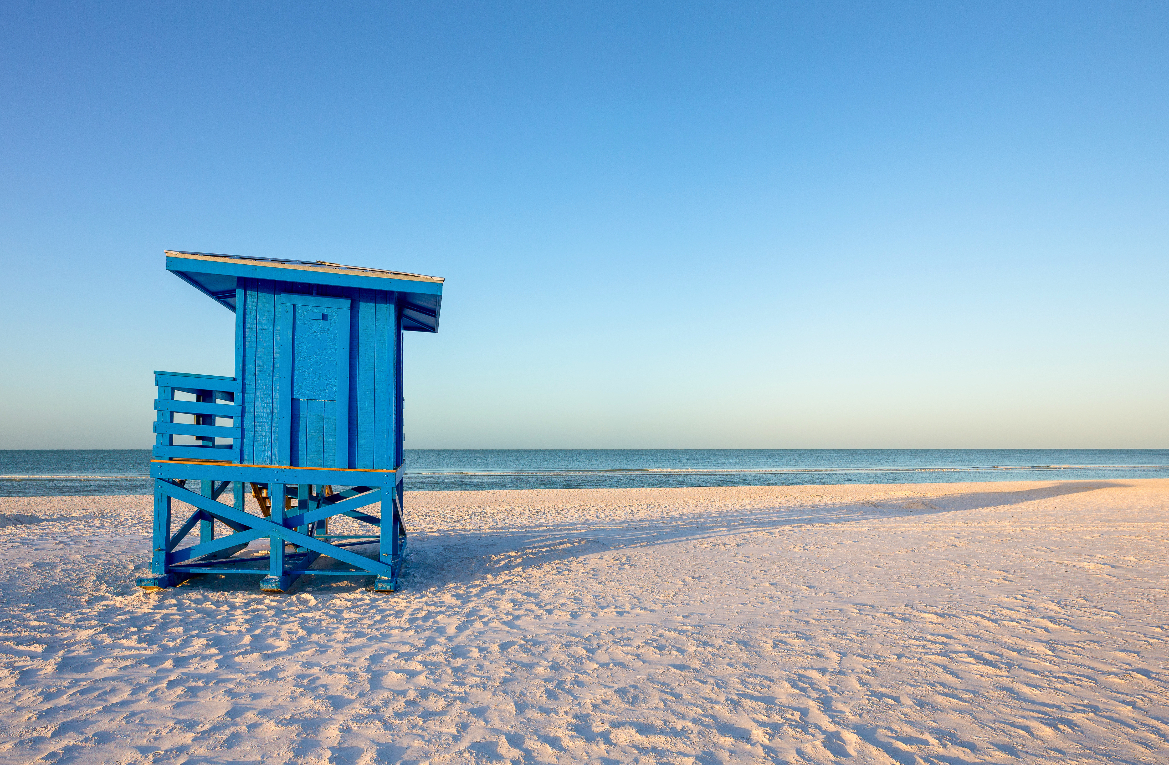 siesta key beach lifeguard stand blue sky sunset water sand