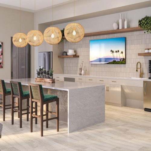 a room with a bar and chairs