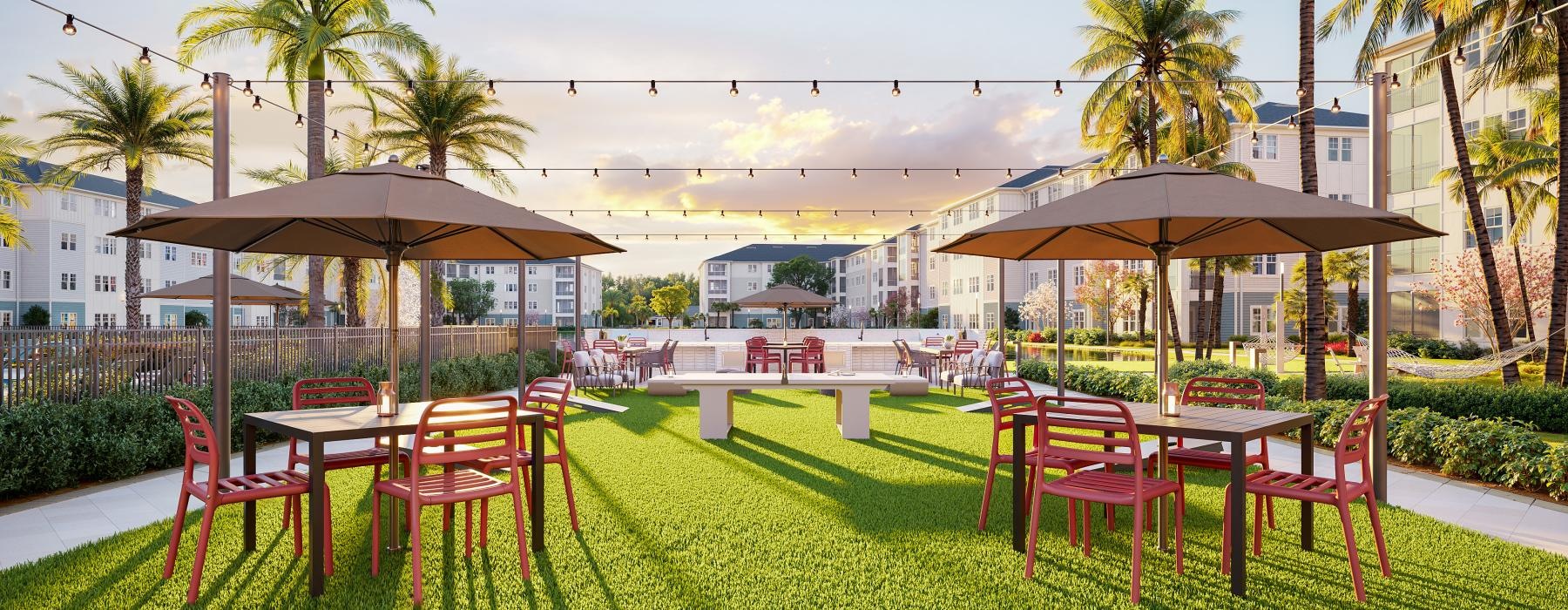 a patio with tables and chairs and umbrellas