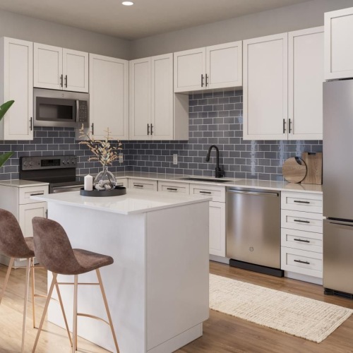 a kitchen with white cabinets